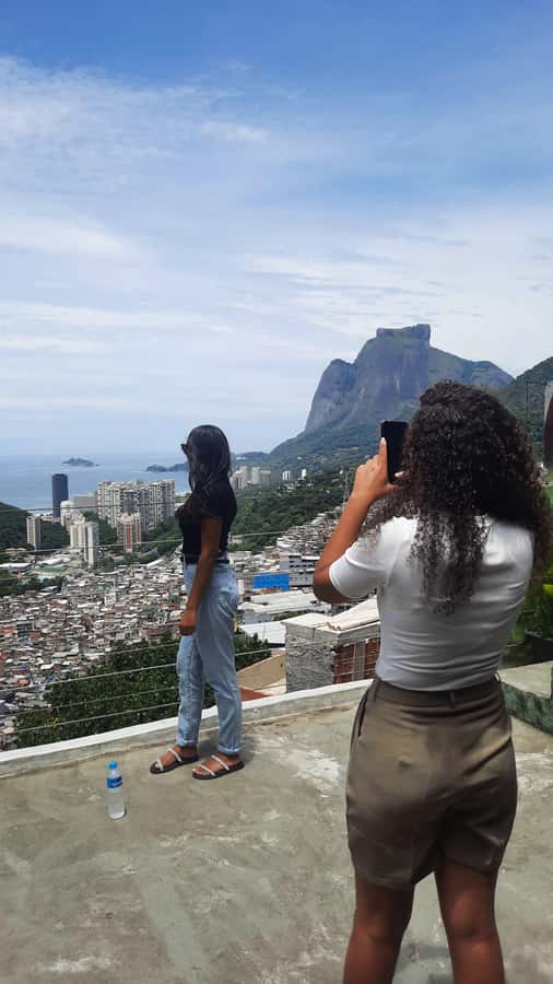 A Walk in the Rocinha Favela: Women Leading the Way - Walking downhill through Rocinha