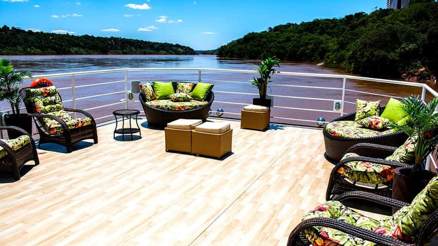 From Foz do Iguaçu: Sunset Catamaran Tour with Meal - From your hotel to the river port