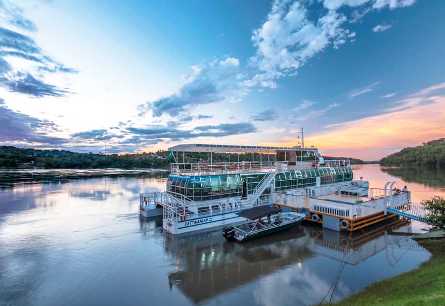 From Foz do Iguaçu: Sunset Catamaran Tour with Meal - The Iguaçu and Paraná Rivers from the deck