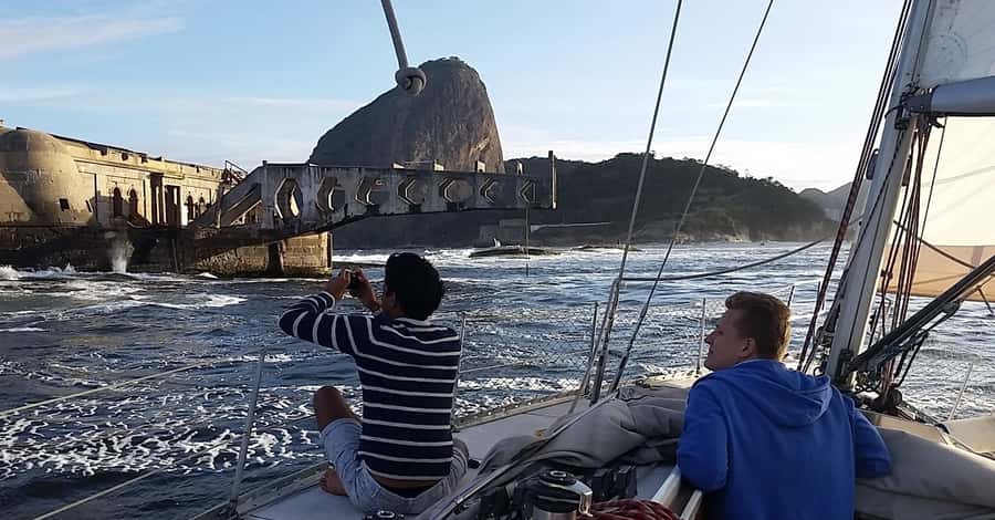 Rio de Janeiro: Guanabara Bay Sunset Sailing Tour & Drinks - Sunset, planes, and changing weather