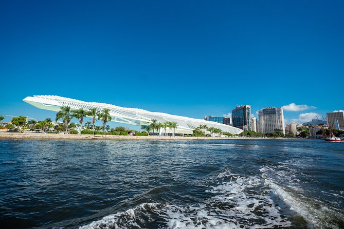Sunset Boat Tour with Beer, Water, Soda and Snacks included - An hour at Adão e Eva Beach